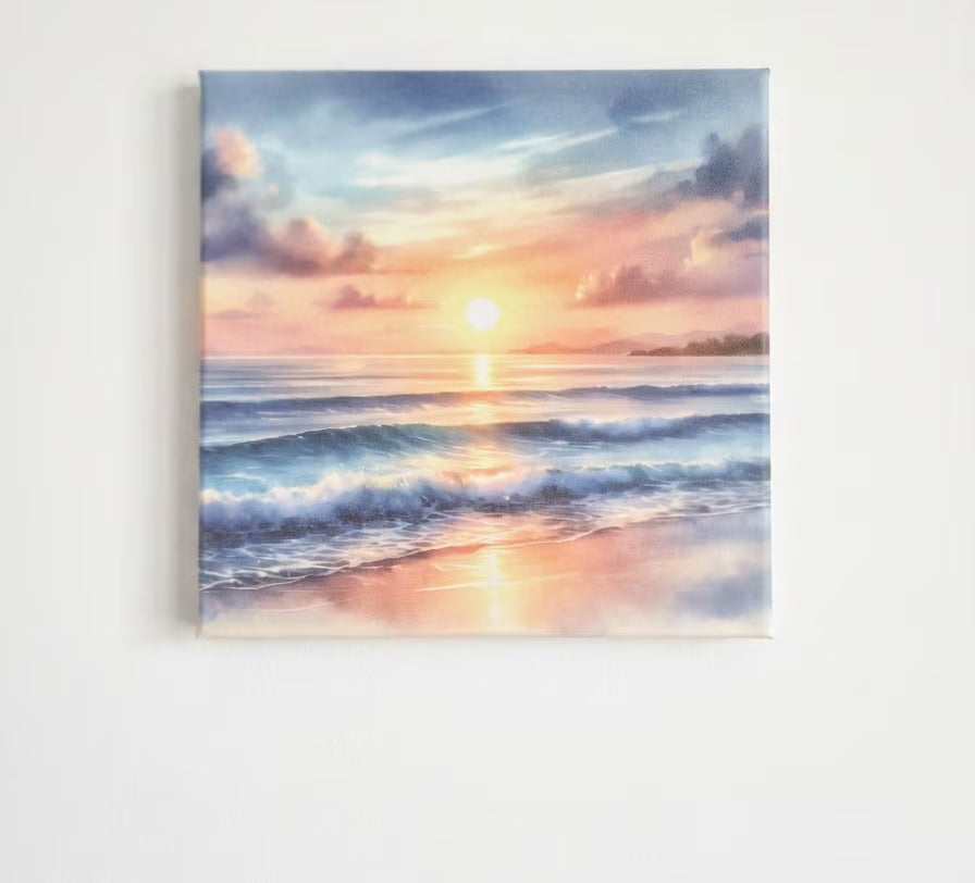 Square canvas wall art featuring a pastel sunset seascape with blue waves, pink and orange clouds, and a glowing sun over the horizon, displayed against a plain white wall.